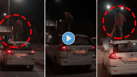 Stunt video viral of two young men doing stunt on running car roof dangerous video viral on social media Stunt video viral of two young men doing stunt on running car roof dangerous video viral on social media