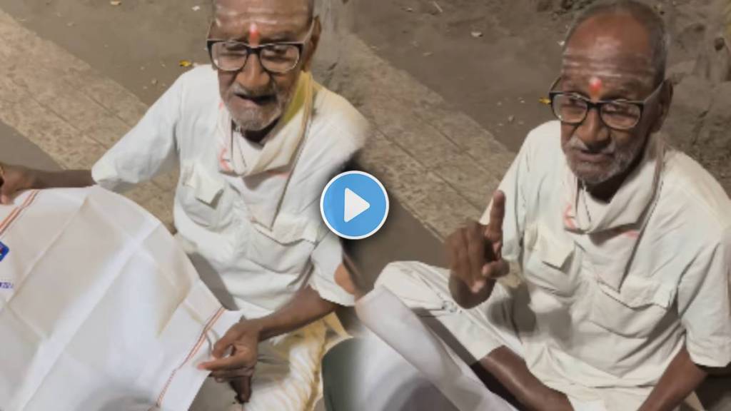old man selling handkerchief for money