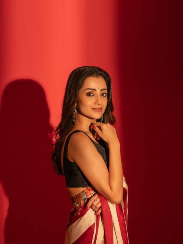 south actress trisha thug life promotion look red and white saree