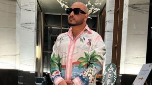 Why was B Prak's father against singing Singer told the reason