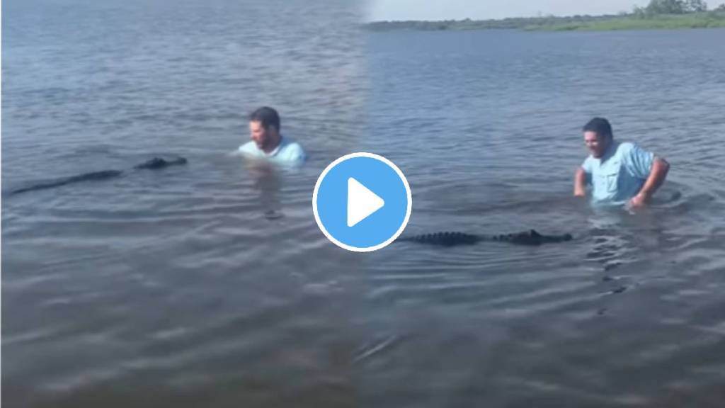 Man hugged dangerous crocodile in the middle of the water video goes viral on social media