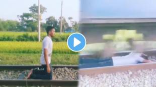 Boy making reel on railway track