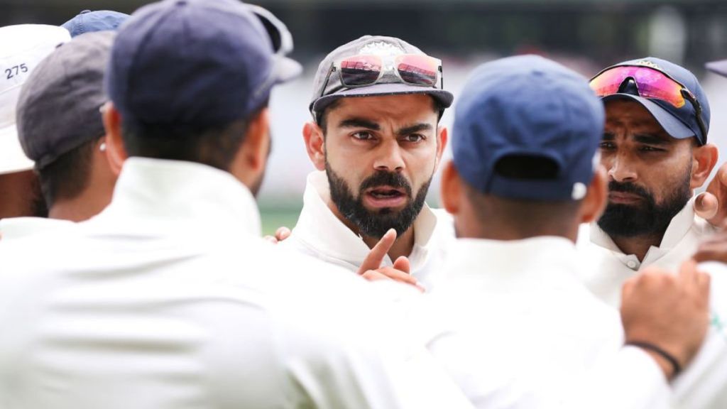 Virat Kohli with teammates