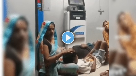 indian Aunty got fed up with the heat and took thier children directly in the ATM to sleep Video