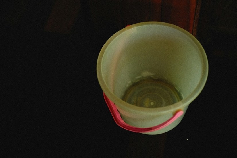Clean bathroom bucket and mug
