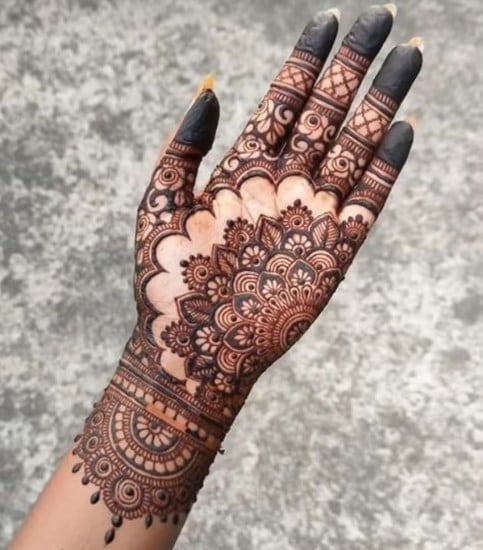 Elegant Mehndi Patterns for Brides Who Choose Gowns Over Lehengas