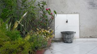 Remove soap scum from bucket