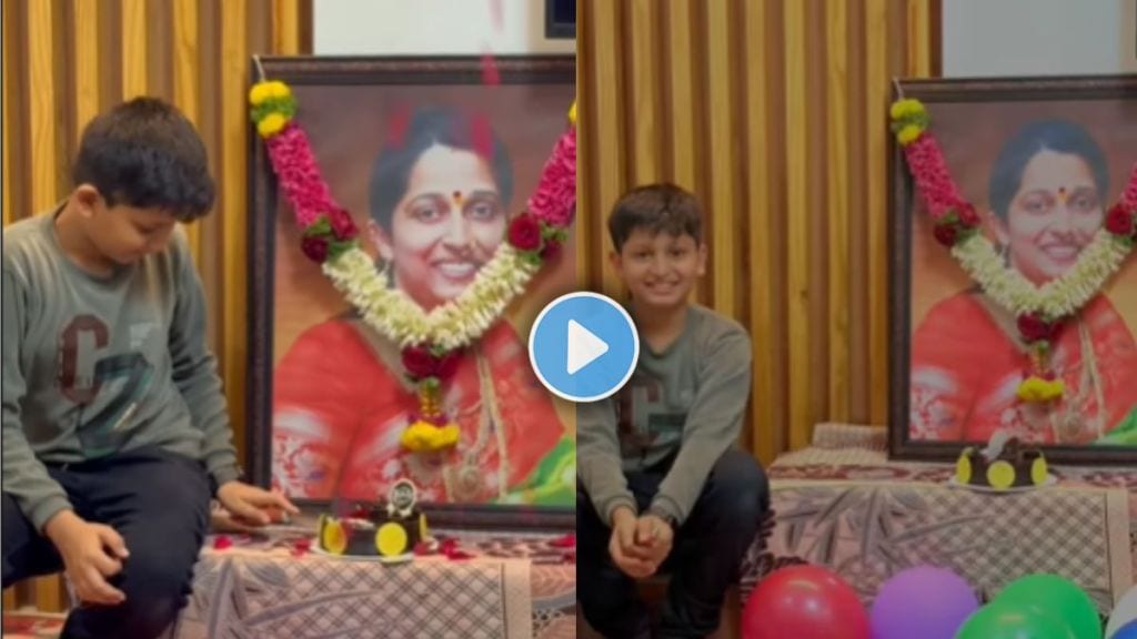 Child cutting cake in front of late mother’s photo in emotional birthday tribute