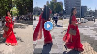 Indian girl wearing saree walking on a street in Japan