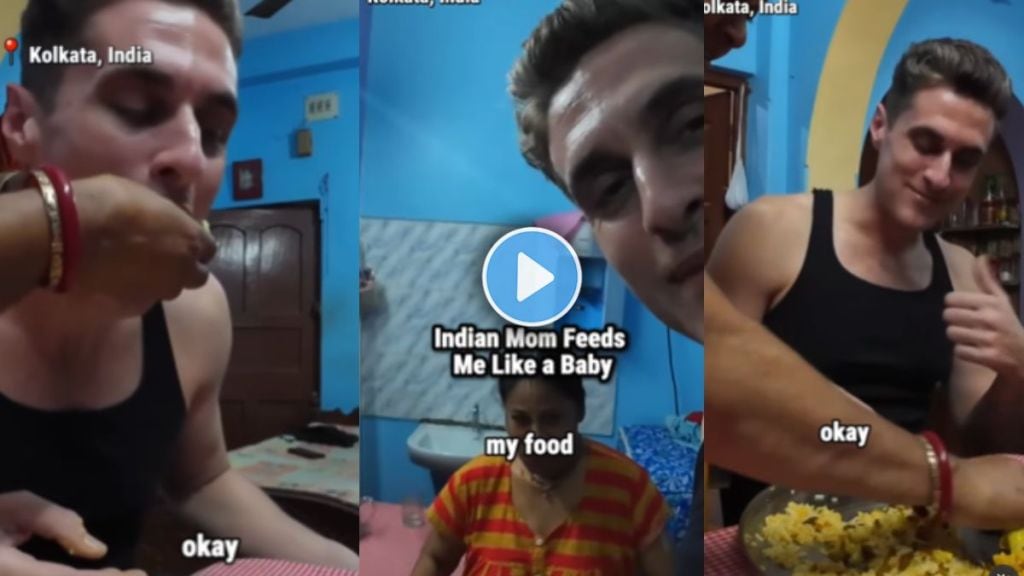 Indian mother lovingly feeding food with her hands to American vlogger