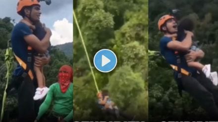 Father bungee jumping with 2-Year-Old Daughter