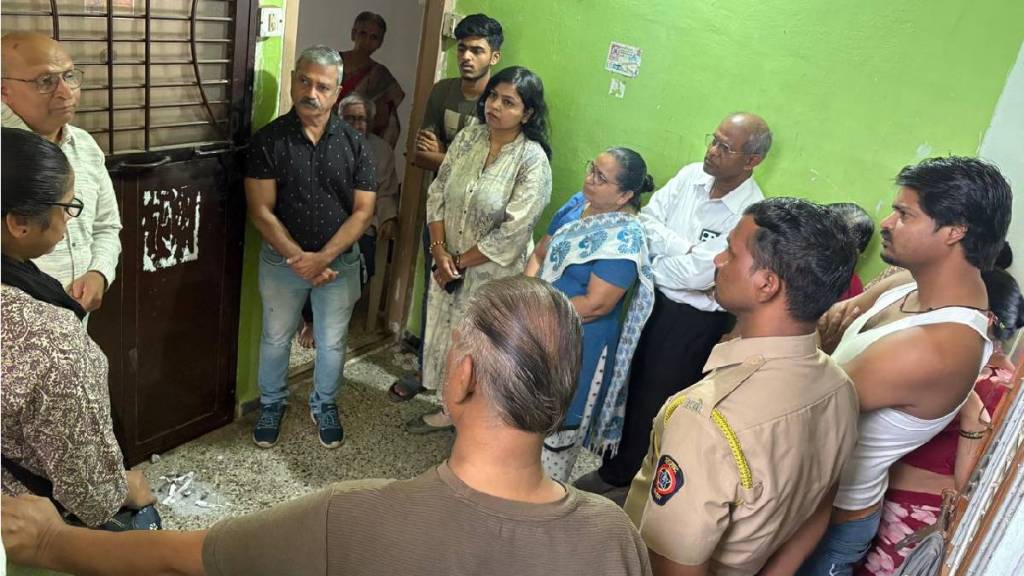 Andhashraddha Nirmulan Samiti activists and police at shanti nagar society