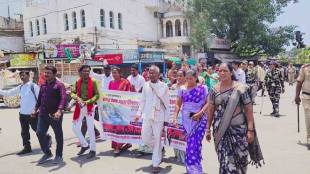 Midday meal women workers marched to Education Minister Dada Bhuse office demanding salary hike