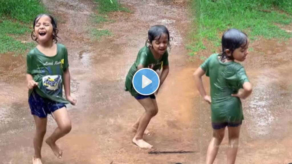 small girl dances in rain