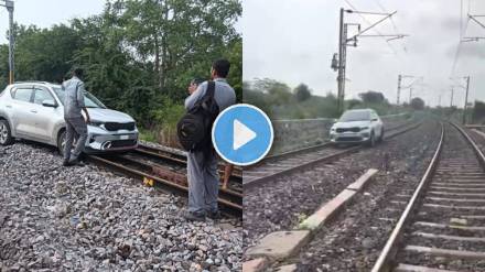 Woman drives car on railway track video