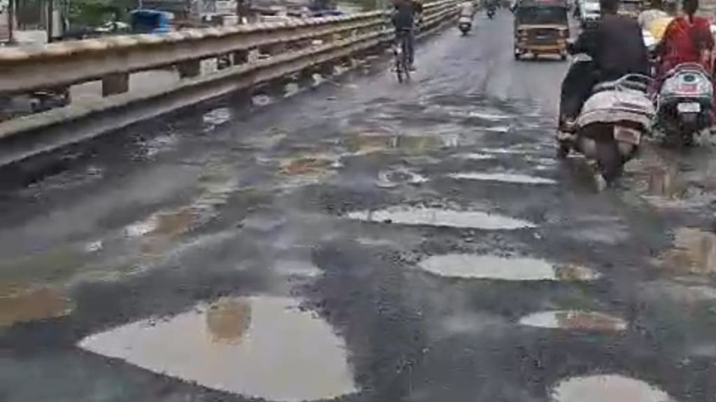 kalyan Potholes on the Shahad flyover causing traffic congestion kalyan Potholes on the Shahad flyover causing traffic congestion