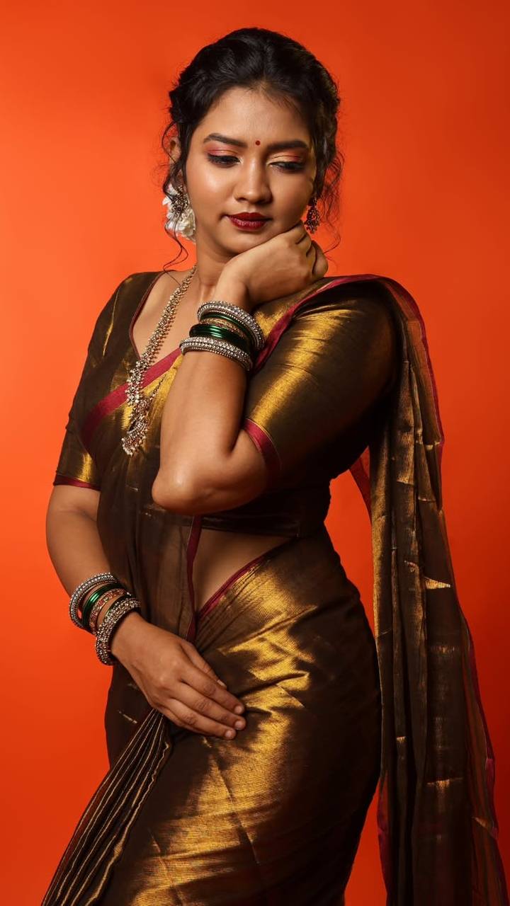 meera joshi south Indian look photoshoot in golden saree