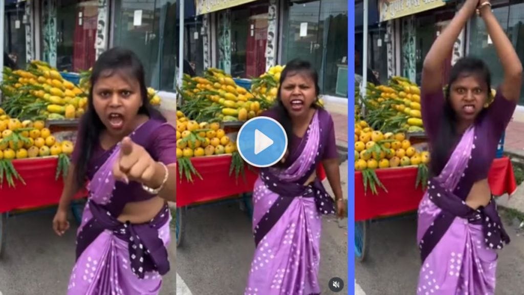 Mango-seller woman smiling and pointing at customers while selling mangoes - viral video