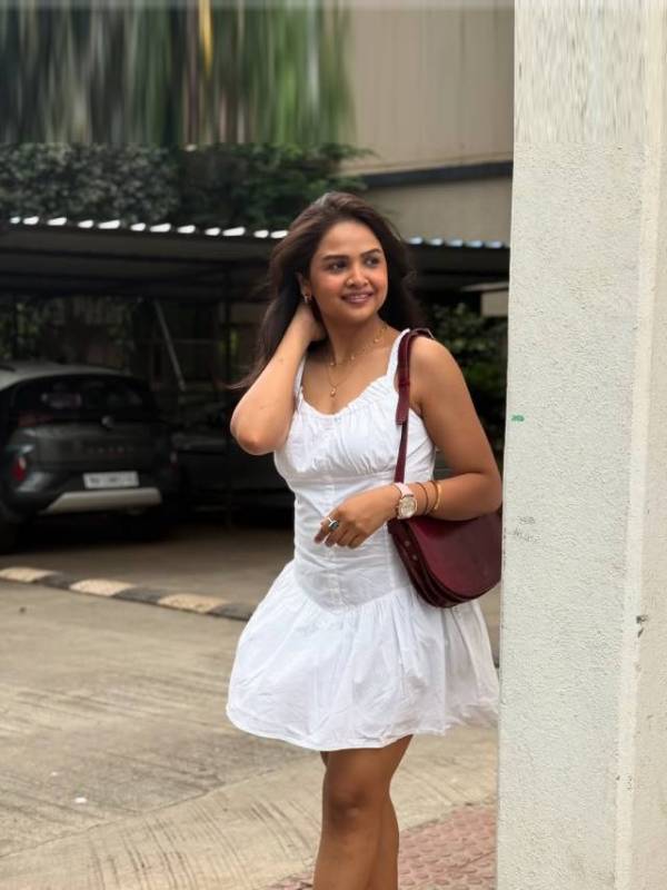 Apurva gore shared new look wearing white one piece short dress