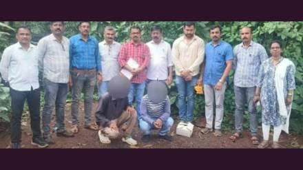 Police team with two accused arrested in action Police team with two accused arrested in action