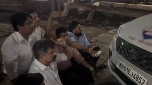 Jitendra Awhad protest in front of a police vehicle