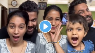 couple and their little girl dance