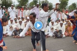 Young girl dance with varkari man