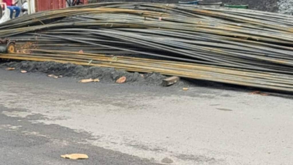 Construction materials dumped on roads in Kalyan dombivli block footpaths causing public inconvenience