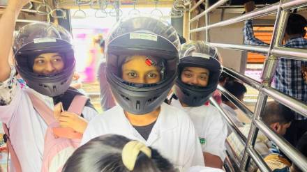 Mumbai on tuesday students wear white t shirts and helmets confused passengers on the local train