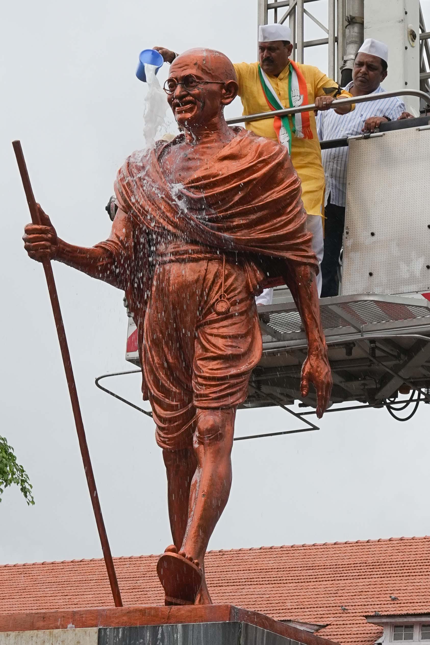 Pune city congress washed the Gandhi statue with milk at Pune railway station during a protest on Monday. A person identified as Suraj Shukla vandalized the statue on Sunday