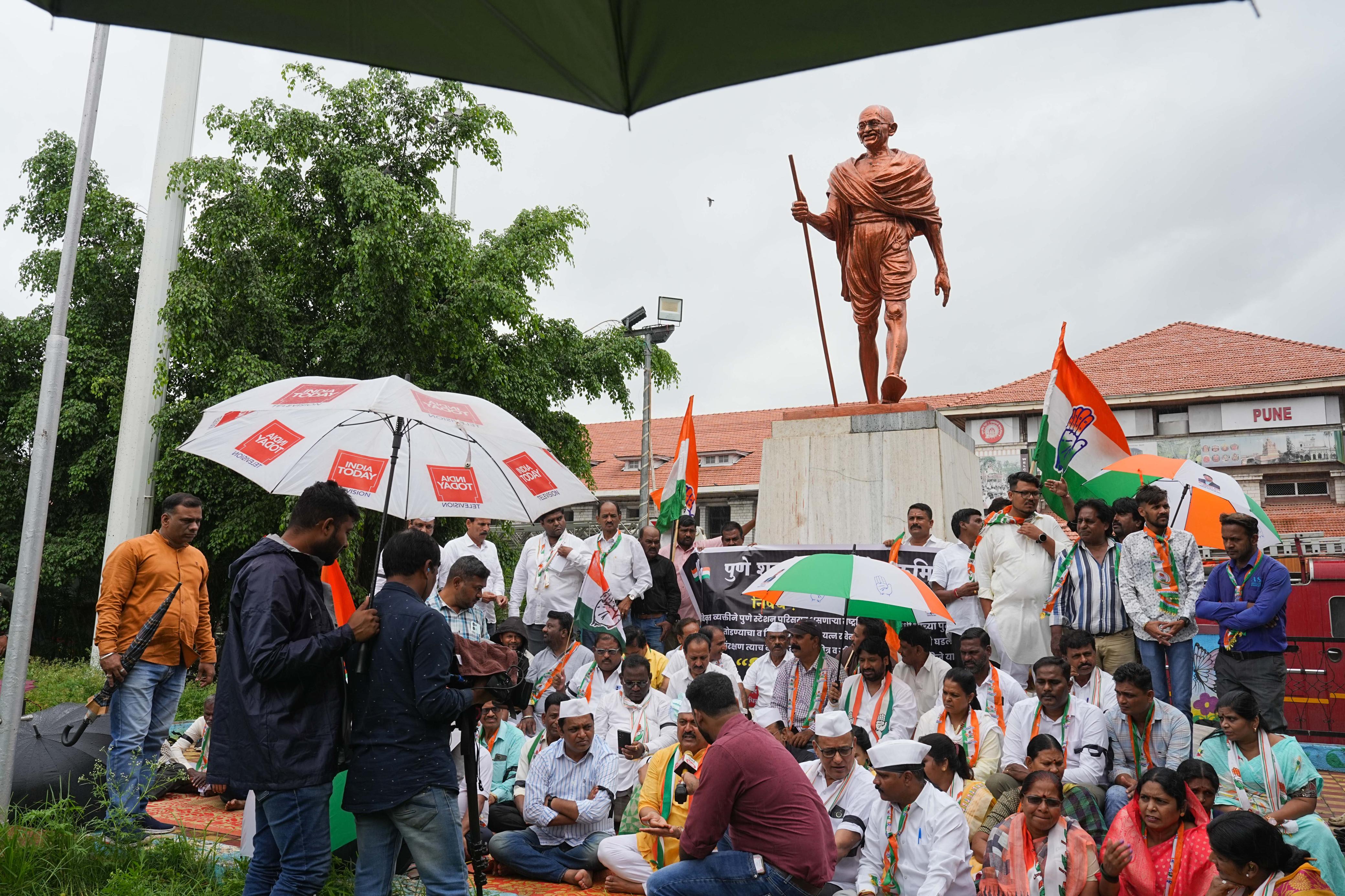Pune city congress washed the Gandhi statue with milk at Pune railway station during a protest on Monday. A person identified as Suraj Shukla vandalized the statue on Sunday