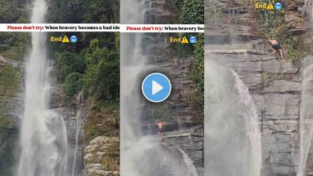 The young man's daring attempt to climb a high waterfall