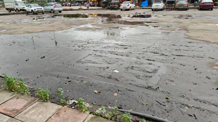 Layers of silt at the parking lot near the Mahaganapati temple in Titwala.