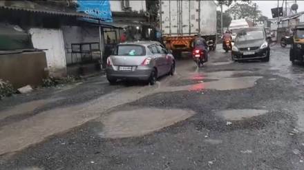 Uran Khopte Bridge potholes dangerous for traffic due to potholes Uran Khopte Bridge potholes dangerous for traffic due to potholes
