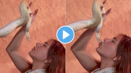 Viral video woman kissing snake