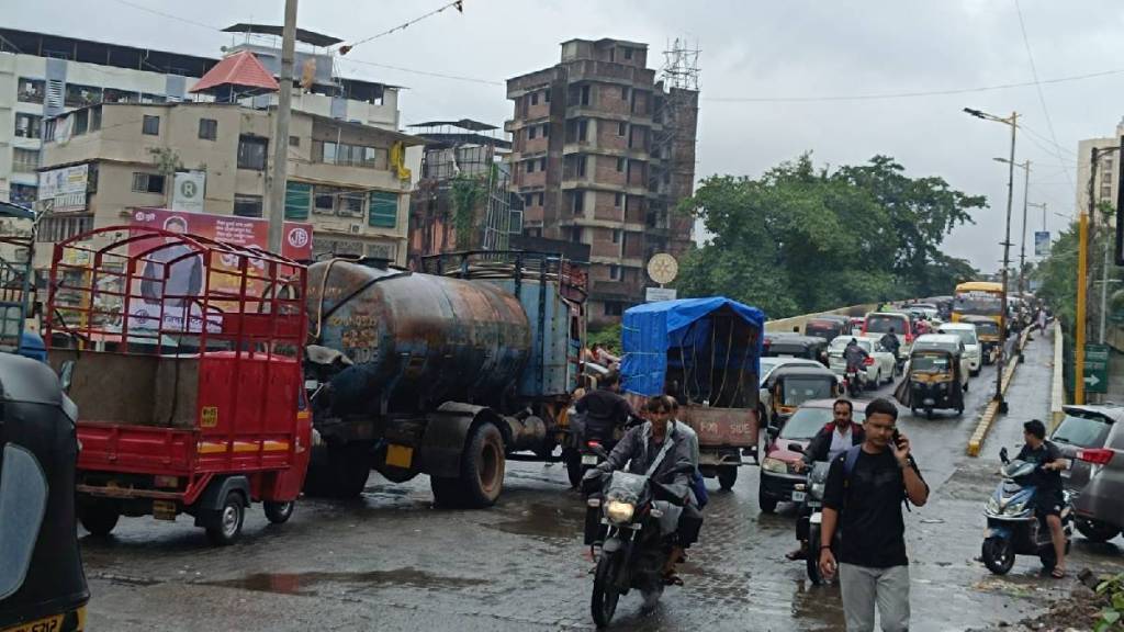 Potholes continue to cause traffic on Badlapur East-West Flyover