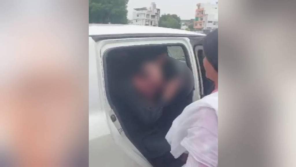 Former Sambhaji Brigade office bearer Dr Gajanan Pardhi beaten with a shoe by a woman akola