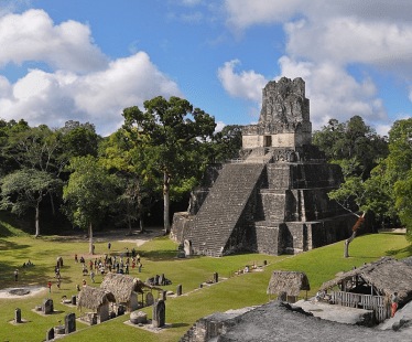 Temple I pyramid of Tikal emerging from Guatemalan rainforest