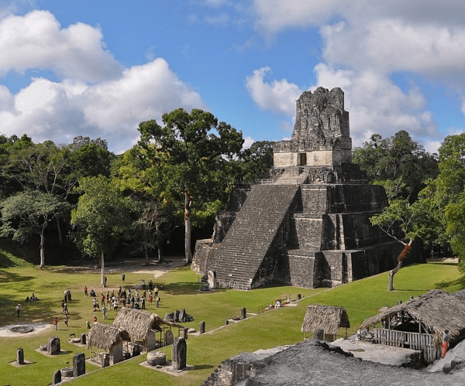 Temple I pyramid of Tikal emerging from Guatemalan rainforest