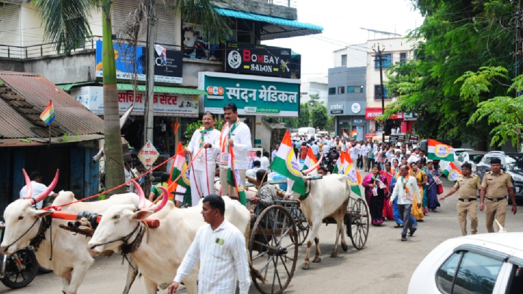 Sarpanches of Walwa Taluka NCP march in Islampur demanding immediate funds for farmers subsidy