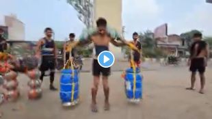 16 year old carries blue drums with 101 ltr gangajal Kanwar