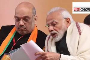 पंतप्रधान नरेंद्र मोदी व केंद्रीय गृहमंत्री अमित शाह चर्चा करताना (छायाचित्र पीटीआय)