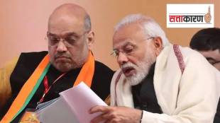 पंतप्रधान नरेंद्र मोदी व केंद्रीय गृहमंत्री अमित शाह चर्चा करताना (छायाचित्र पीटीआय)