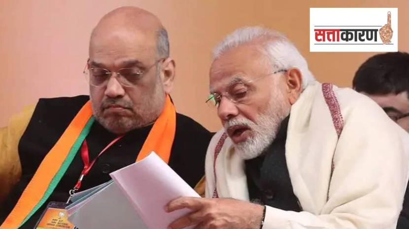 पंतप्रधान नरेंद्र मोदी व केंद्रीय गृहमंत्री अमित शाह चर्चा करताना (छायाचित्र पीटीआय)