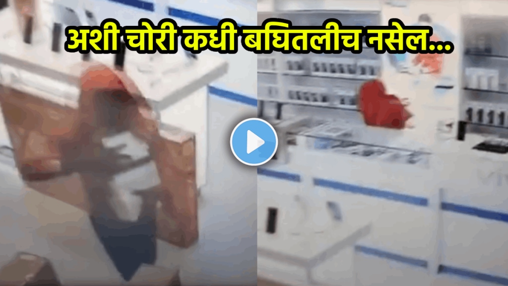 Robbery Video thief stole around 5 lakhs mobile from shop Hyderabad viral video