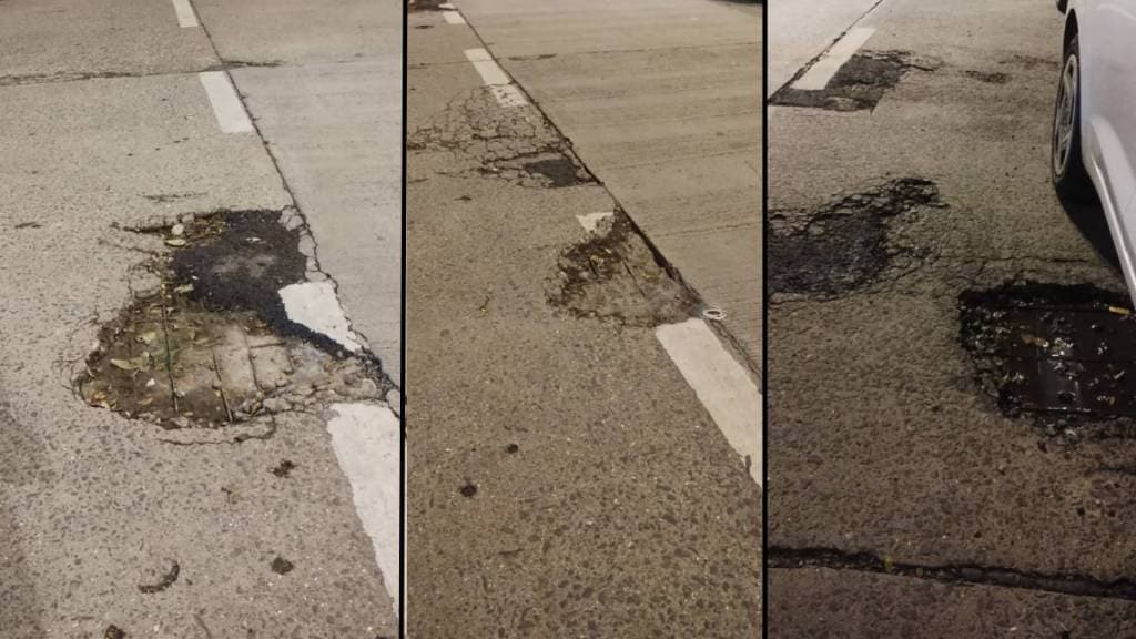 Potholes on the road in front of the Express Tower and the five-star Trident Hotel in the Nariman Point area