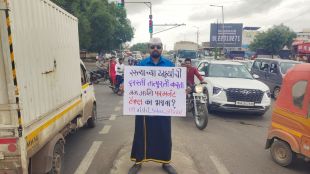 pimpri worker demands loan to fill potholes in unique civic protest pcmc pune print