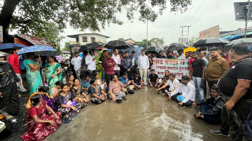 Dighode villagers protest by sitting in a pit