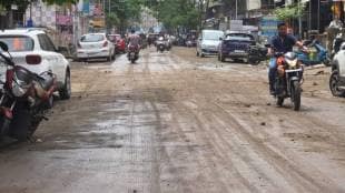 slippery road condition in Vasai Virar due to mud from heavy vehicle