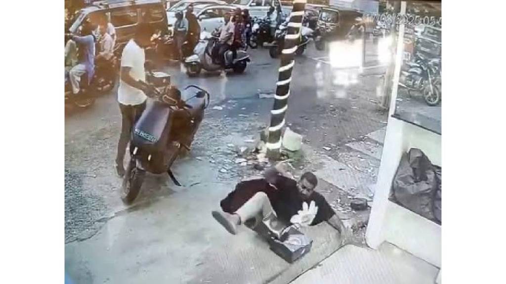 A person fell into a drain and was seriously injured at Chandrapur Janata Mahavidyalaya Chowk